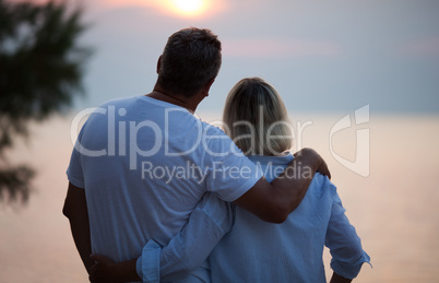 Romantic couple enjoying the sunset