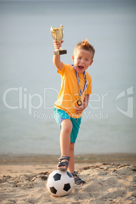 Young Boy Celebrating Championship Soccer Win