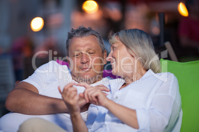 Loving middle-aged couple having an intimate chat