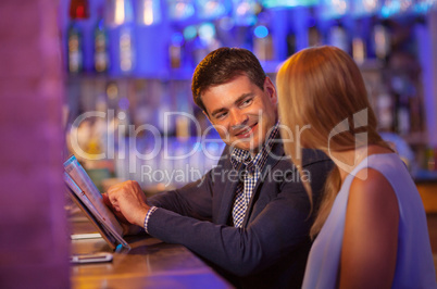 Adult couple in bar