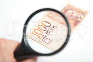 Magnifying Glass on the Colombian Pesos.