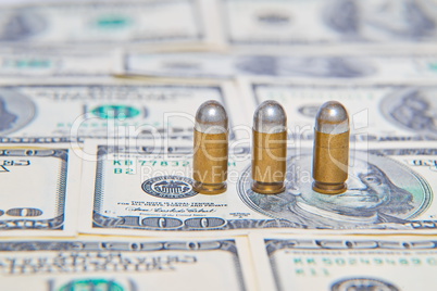 Bullets on dollar bills