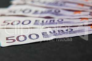 Five hundred euro banknotes in a row