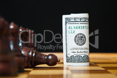 Hundred dollar bill instead of  chess figure.