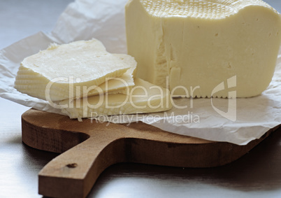 cheese on a cutting board