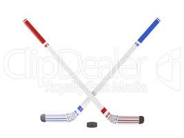 Ice hockey sticks and puck