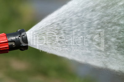 stream of water from a fire hose