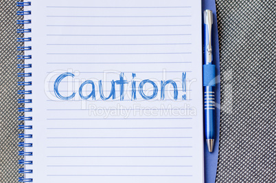 Caution write on notebook