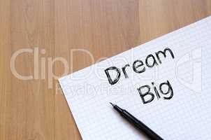 Dream big write on notebook