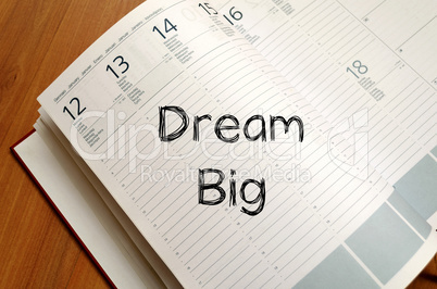 Dream big write on notebook