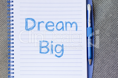 Dream big write on notebook