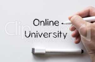 Online university written on whiteboard