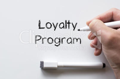 Loyalty program written on whiteboard