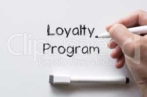 Loyalty program written on whiteboard