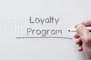 Loyalty program written on whiteboard