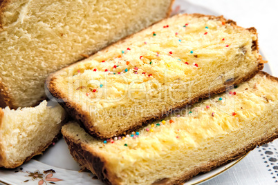 Appetizing sweet white bread on the plate.