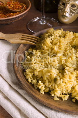 Risotto with Saffron on wooden table