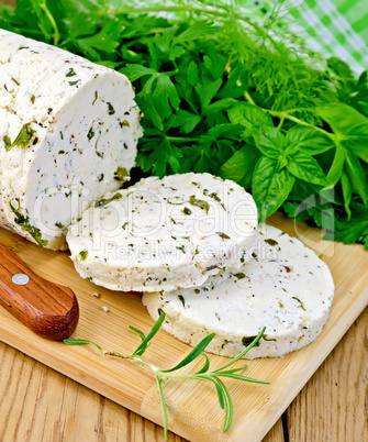 Cheese homemade with spices and napkin on board