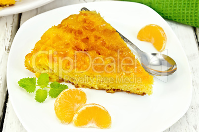 Pie mandarin with mint on light board