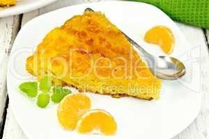 Pie mandarin with mint on light board