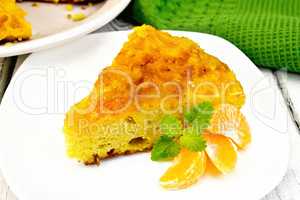 Pie mandarin with mint on table