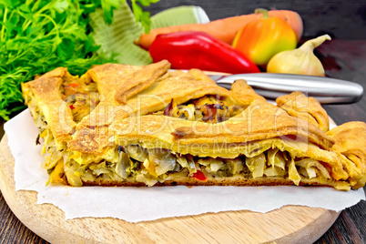 Pie with cabbage and sorrel on parchment