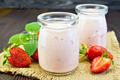 Yogurt with strawberries on sacking