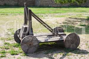 old wood catapult concept photo