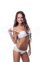 Happy tanned model advertises erotic underwear
