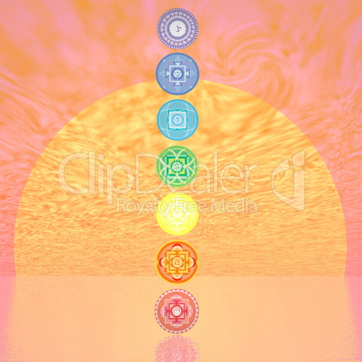 Seven chakra symbols column by sunset - 3D render