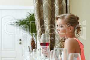 Image of bored beautiful girl in restaurant