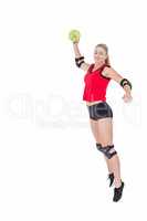 Female athlete with elbow pad throwing handball