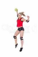 Female athlete with elbow pad throwing handball