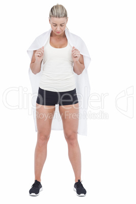 Female athlete holding a white flag