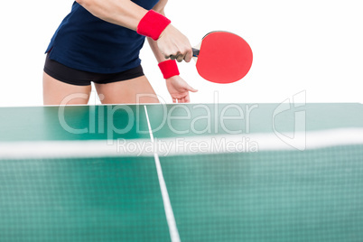 Ping pong player hitting the ball