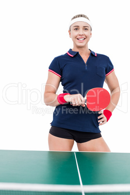 Female athlete playing ping pong