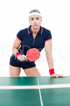 Female athlete playing ping pong