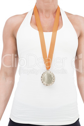 Female athlete wearing a medal