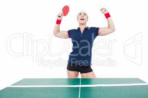 Female athlete playing ping pong