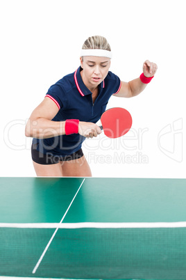 Female athlete playing ping pong