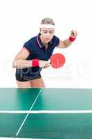 Female athlete playing ping pong