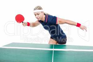 Female athlete playing ping pong