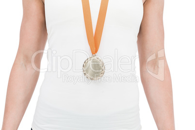 Female athlete wearing a medal