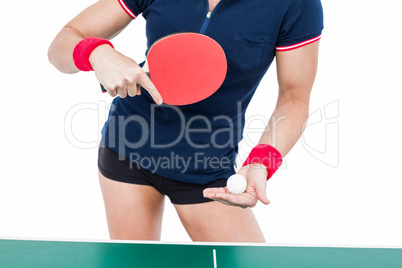 Female athlete playing ping pong