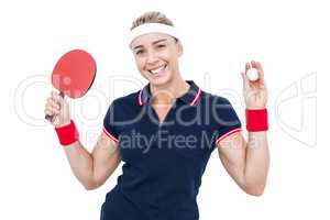 Female athlete playing ping pong