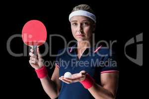 Female athlete playing ping pong