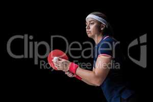 Female athlete playing ping pong