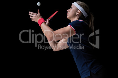 Female athlete playing ping pong