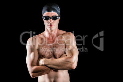 Swimmer posing with arms crossed