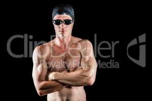 Swimmer posing with arms crossed